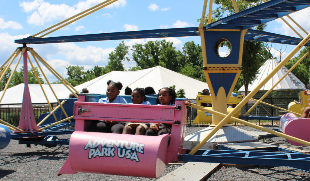 Guests Riding Roadrunner Scrambler at Adventure Park USA